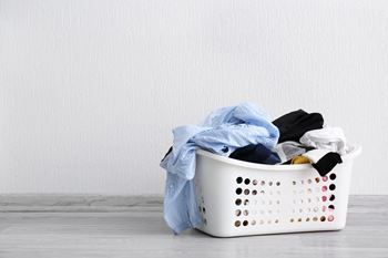 a laundry basket full of clothes